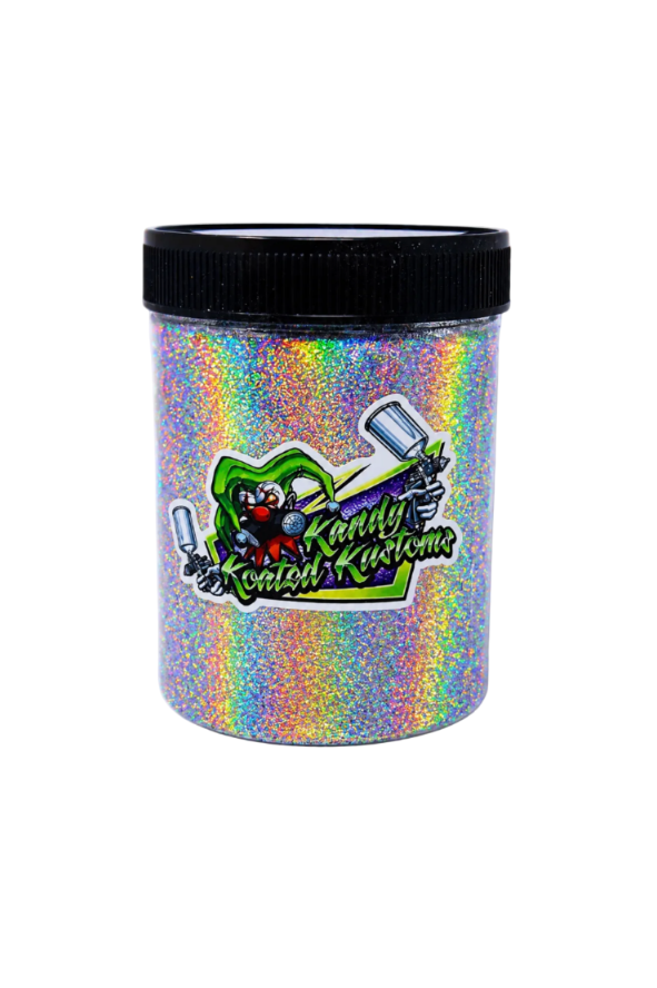 A cylindrical plastic jar filled with iridescent holographic glitter, featuring a black screw-top lid and a colorful 'Candy Ketch Kuretake' logo on the front, set against a plain white background.